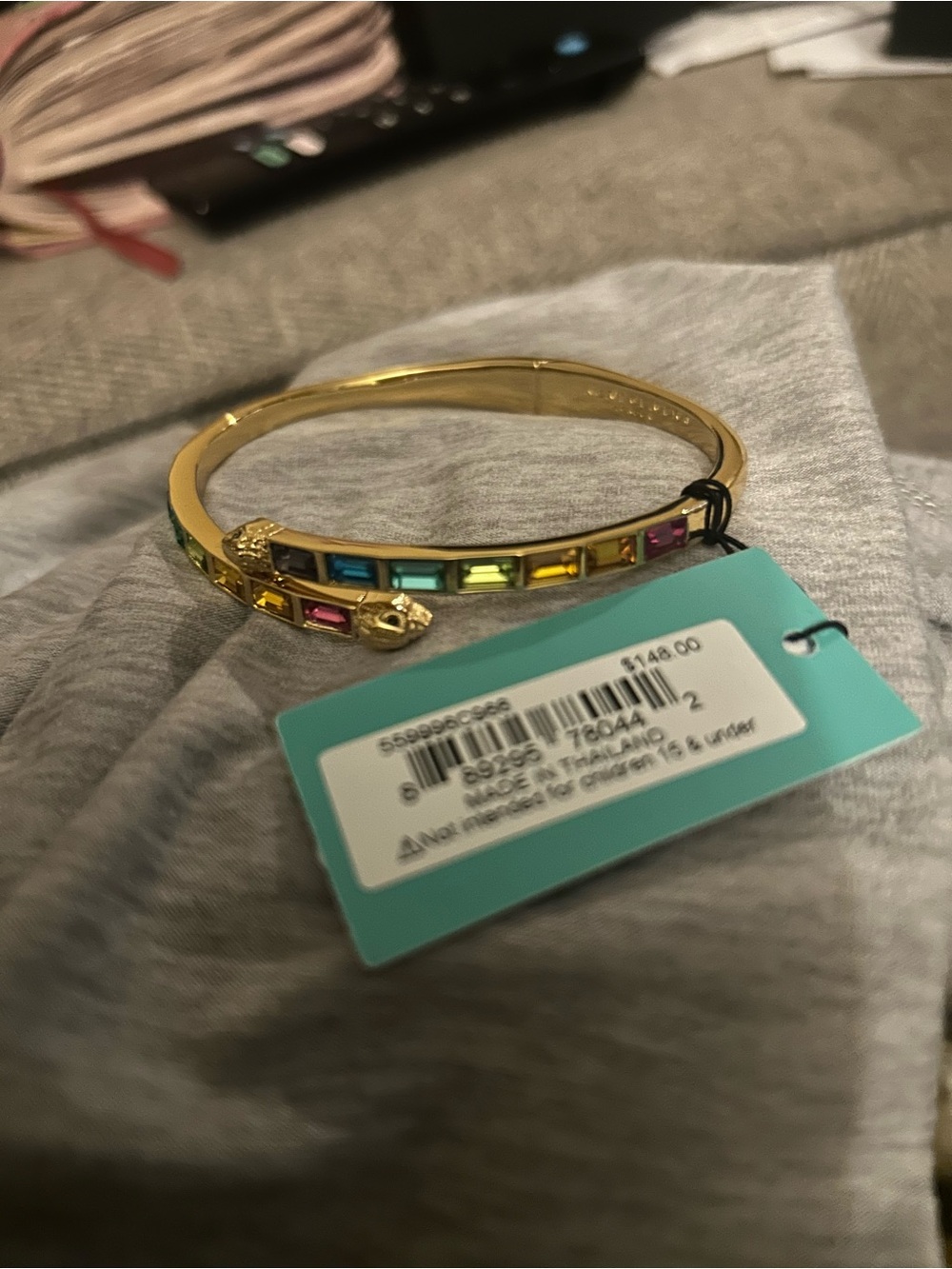 Kurt Geiger Gold Bracelet with Pink, Blue, Green and Yellow Stones